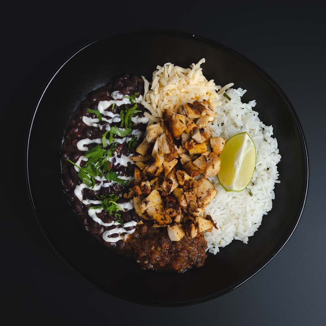 Chicken bowl with rice, black beans and salsa