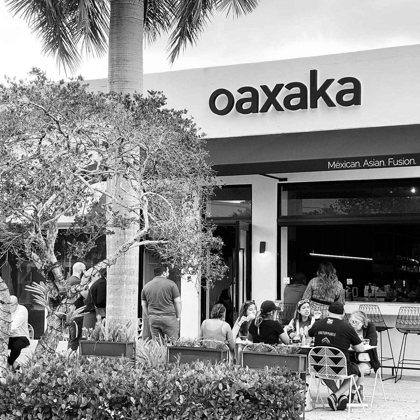 Oaxaka storefront and sidewalk seating in Hollywood, Florida